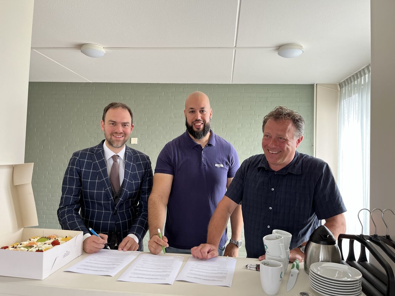 Ondertekening van de overeenkomst 
