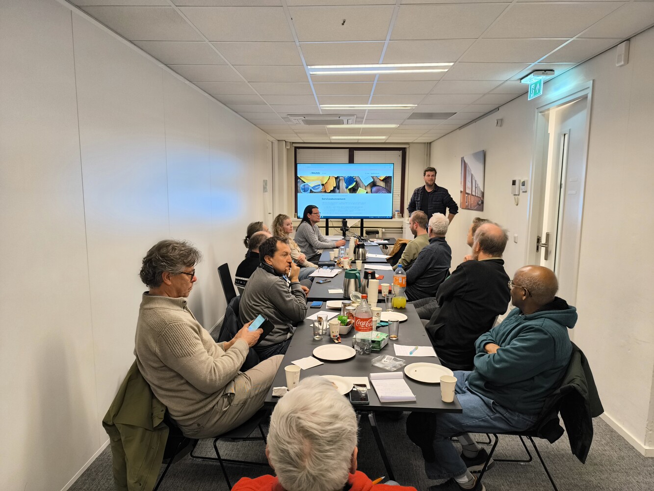 Bijeenkomst met energiefixers aan tafel