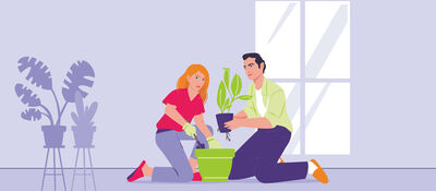 Twee personen poten een plant in een groene pot voor een raam