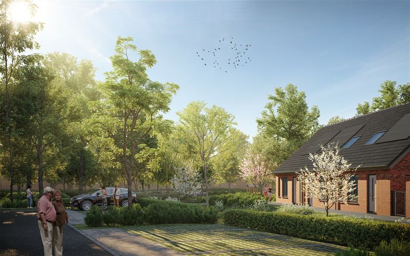 Groene wijk Hal5 gezien vanaf een parkeerplaats, met bomen en woningen op de achtergrond.
