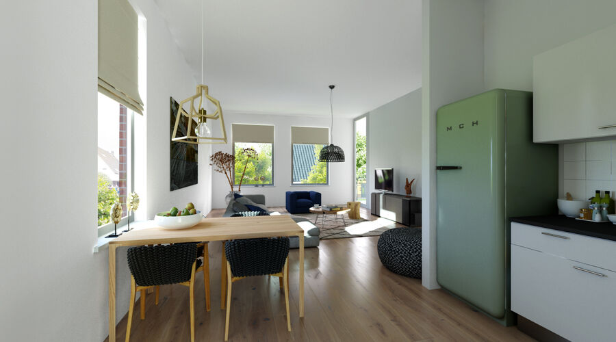 Interieurimpressie met de keuken op de voorgrond. Op rechts is de keuken te zien met een groen koelkast en daarnaast een tafel met vier stoelen