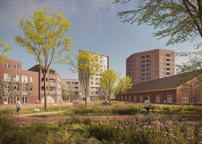 Impressiefoto van het Kazernekwartier met veel groen in het midden, omringd door hoge en lage gebouwen